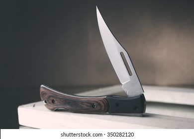 Pocket Knife On The Table