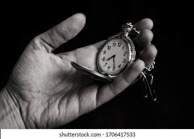 black and white pocket watch