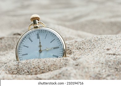 Pocket Watch Buried In Sand