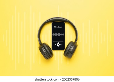 Podcast Icon. Audio Equipment With Microphone, Sound Headphones, Podcast Application On Mobile Smartphone Screen. Radio Recording Sound Voice On Yellow Background. Broadcast Media Music Concept