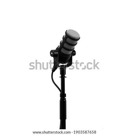 Podcast microphone on a tripod, a black metal dynamic microphone on an isolated white background, for recording podcast or radio program, show, sound and audio equipment, technology, product photo