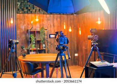 Podcast studio with soundproofing for youtube channels starting to make podcasts for most popular videos. Podcast media studio for broadcasting audio. Podcasting microphone speech or interview.