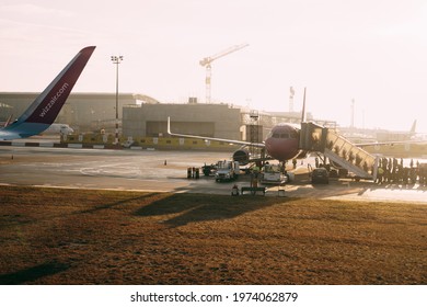 Podgorica, Montenegro - 02 July 2020: An Airport With Planes At The Sunset.