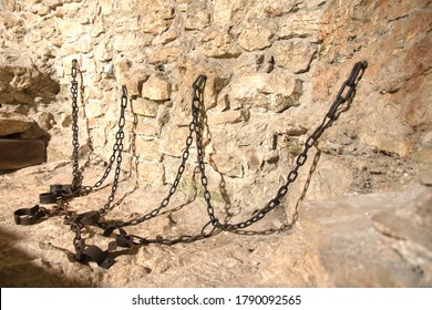 Spišské Podhradie Slovakia July 31, 2020 Iron bondage and chain. Medieval device in the torture chamber of the Spissky hrad, Szepes vár. Nowadays, it is a popular place for family excursions.