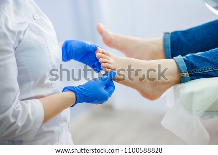 Podiatry doctor examines the foot Zdjęcia stock © 