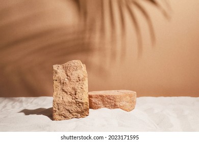 Podium on sand background. Display with sunshade and shadow on the background for cosmetic perfume fashion natural product - Powered by Shutterstock