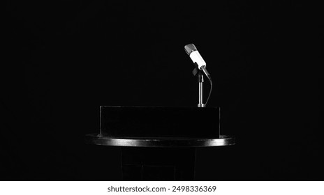 podium rostrum with a microphone on a black background - Powered by Shutterstock