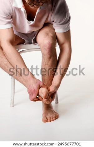 Podological problems. Experiencing sharp pain from flattened arches of feet. Hurtful foot dislocation from unbalanced blow of ankle joint. Getting foot injured from active sports