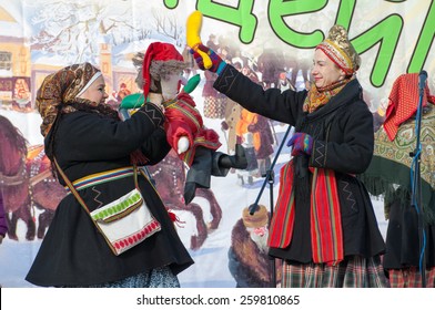 PODOLSK, OSTAFIEVO, RUSSIA - FEBRUARY 21: Unidentified women fights by stick on Russian religious and folk holiday Maslenitsa in estate Ostafievo on February 21, 2015, near Podolsk, Russia