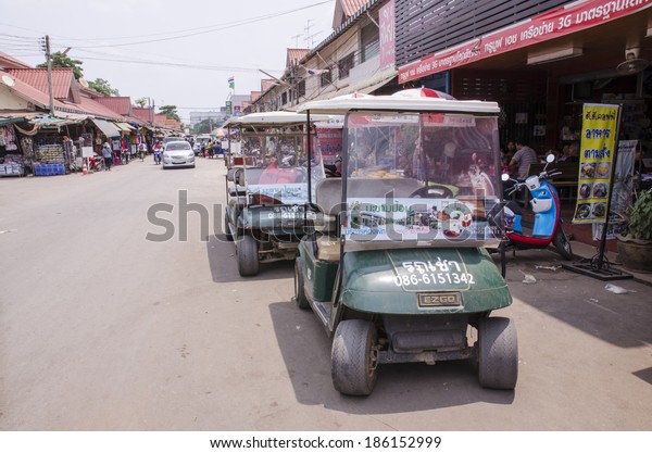 POI\
PET, THAILAND - MARCH 19: Thai golf car for rent waiting for\
customers on march 19, 2014 in Poi Pet,\
Thailand.