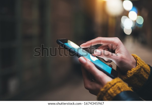 point\
finger on screen mobile phone closeup, person texting text message,\
hipster touch blue screen on smartphone light night city, girls\
using in hands cellphone close up, online\
internet