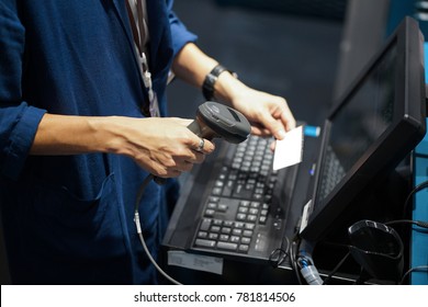 Point of sales shot, barcode or QR code scanning front of computer.