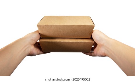 Point Of View Hand Of Courier Holds The Cardboard Box Of Food Delivery To The Customer Isolated On White