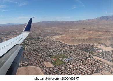 Point of view of a plane over the periphery of Las Vegas with the plane's garlic, The picture was shoot in Las Vegas, Usa, the 29 july 2019.  - Shutterstock ID 2000468297