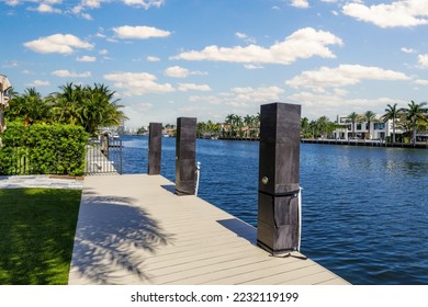 point of view of the sunrise key neighborhood in Fort Lauderdale, you can see the Rio Barcelona canal, modern and luxury houses, blue sky boats and tropical climate - Shutterstock ID 2232119199