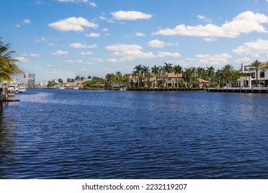 point of view of the sunrise key neighborhood in Fort Lauderdale, you can see the Rio Barcelona canal, modern and luxury houses, blue sky boats and tropical climate - Shutterstock ID 2232119207