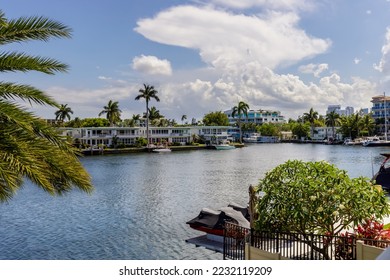 point of view of the sunrise key neighborhood in Fort Lauderdale, you can see the Rio Barcelona canal, modern and luxury houses, blue sky boats and tropical climate - Shutterstock ID 2232119209