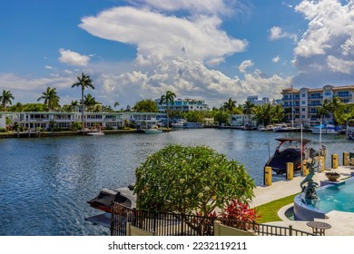 point of view of the sunrise key neighborhood in Fort Lauderdale, you can see the Rio Barcelona canal, modern and luxury houses, blue sky boats and tropical climate - Shutterstock ID 2232119211