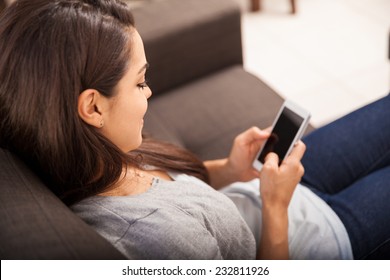 Point Of View Of A Young Woman Using A Smart Phone For Texting. Focus On The Woman