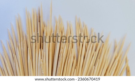 Pointed toothpicks isolated on a white background. flat lay ,close-up view.
