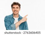 Pointing, offer and man in studio, portrait and announcement discount deal on white background. Person, mockup space and model with hand gesture, opportunity and choice with sales, decision and smile