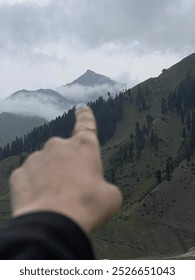 Pointing towards a peak in clouds