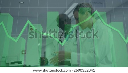 Pointing two doctors with stethoscopes analyzing patient chart at nursing station with data overlay. Medical, teamwork, professional, diagnostic, healthcare, analytics, clinical