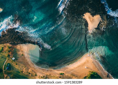 Poipu Hawaii Beach Park Aerial Overhead Drone Shot. Morning Light, Turquoise Water, Palm Trees, Rolling Waves, Lifeguard Tower And Sleeping Turtle On The Shoreline