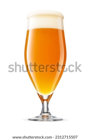 Pokal glass of fresh frothy yellow wheat unfiltered beer with cap of foam isolated on white background.