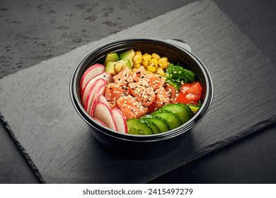 Poke bowl with salmon, avocado, radish, cucumber, tomato, sweet corn and chukka salad in plastic bowl - Powered by Shutterstock