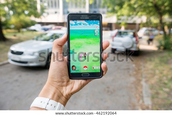 Pokemon and drive: Pokemon GO augmented reality\
smartphone game dangerous trend to catch pokemons while driving,\
Sofia, Bulgaria, July 28,\
2016.