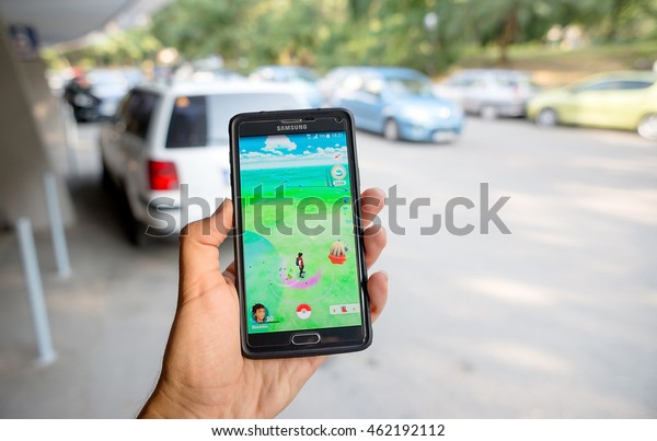 Pokemon and drive: Pokemon GO augmented reality\
smartphone game dangerous trend to catch pokemons while driving,\
Sofia, Bulgaria, July 28,\
2016.
