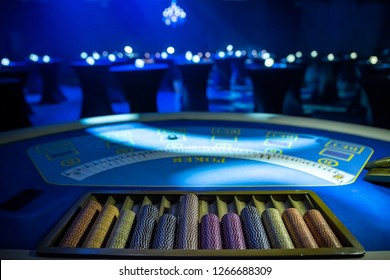 Poker Or Black Jack Table And Betting Chips On A Casino Table. Empty Poker Table With No People And Nobody Around The Hall. Las Vegas Empty Casino In Corona Virus Times