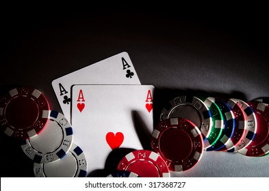 poker cards and chips on background