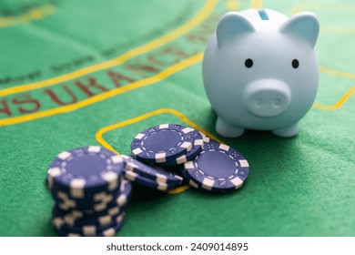 Poker cards royal flush, cash money dollar bills. Gambling, casino chips, dices. Casino tokens, gaming chips, checks, or cheques on green table in casino club. - Powered by Shutterstock