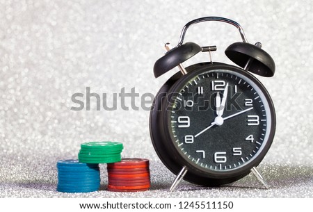 Poker chips. Alarm clock