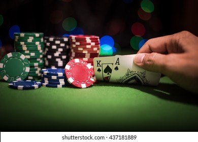 Poker chips with blur background on table in casino