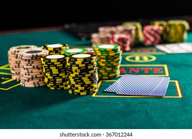 Poker chips on a poker table at the casino