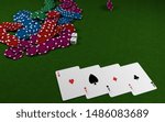 Poker chips stack with two cards. Two dices. On the green table. 3D rendering