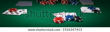 poker game concept on green table, long photo