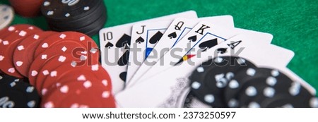 Poker game table with cards and chips