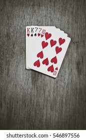 Poker Hands - TWO-PAIR. Five playing cards forming the famous poker dead man's hand. The dead man's hand is a hand of two pair, consisting of black aces and eights.