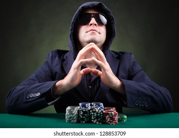 Poker Player On Black Background