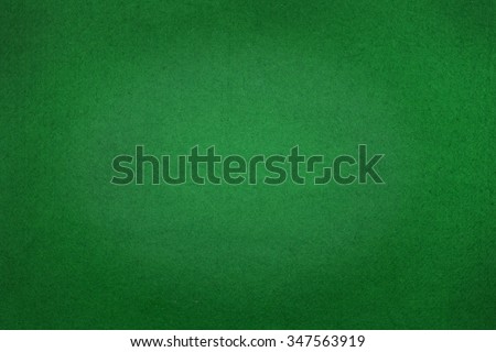Poker table felt background in green color
