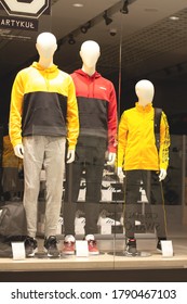 POLAND, BYDGOSZCZ - July 27, 2020: Three Male Mannequins In Sports Wear. Store Window With Casual Collection For Men And Child
