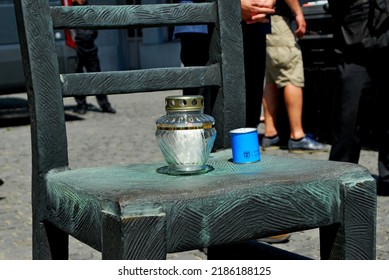 KRAKÓW, POLAND - July 2022. Holocaust Memorial - Ghetto Heroes Square. Art Installation From 2005  - Cast-iron Chairs Reminding Us Of What Was Left After The Liquidation Of The Krakow Ghetto.