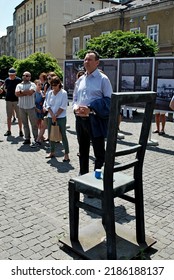 KRAKÓW, POLAND - July 2022. Holocaust Memorial - Ghetto Heroes Square. Art Installation From 2005  - Cast-iron Chairs Reminding Us Of What Was Left After The Liquidation Of The Krakow Ghetto.