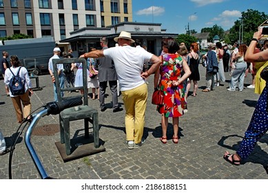 KRAKÓW, POLAND - July 2022. Holocaust Memorial - Ghetto Heroes Square. Art Installation From 2005  - Cast-iron Chairs Reminding Us Of What Was Left After The Liquidation Of The Krakow Ghetto.