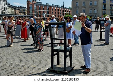 KRAKÓW, POLAND - July 2022. Holocaust Memorial - Ghetto Heroes Square. Art Installation From 2005  - Cast-iron Chairs Reminding Us Of What Was Left After The Liquidation Of The Krakow Ghetto.