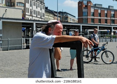 KRAKÓW, POLAND - July 2022. Holocaust Memorial - Ghetto Heroes Square. Art Installation From 2005  - Cast-iron Chairs Reminding Us Of What Was Left After The Liquidation Of The Krakow Ghetto.